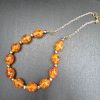 Glitzy Orange Bead Necklace